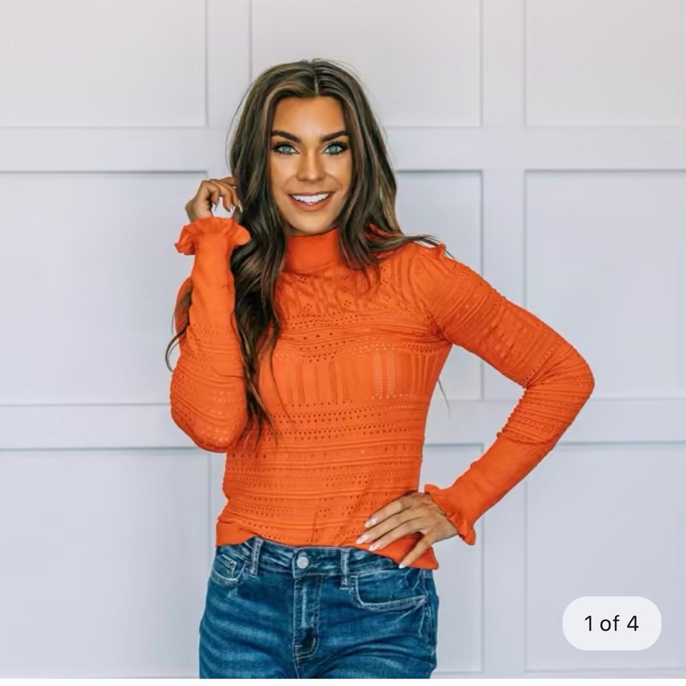 Orange sweater worn twice. Beautiful sweater just not my style